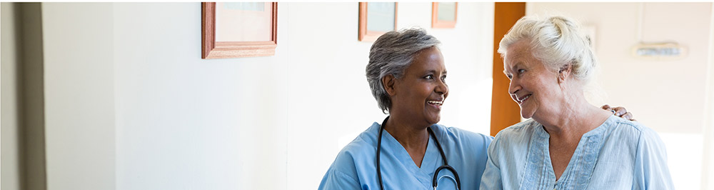 Patient and Doctor smiling together