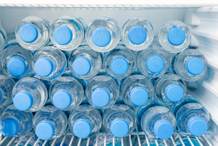 water bottles sitting in the fridge
